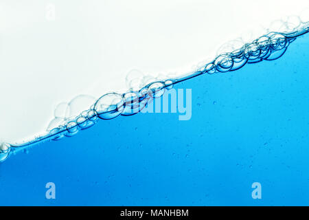 Water and air bubbles over white background Stock Photo