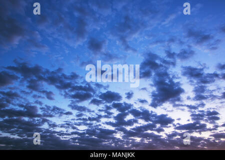 Sunset of small clouds in the blue sky Stock Photo