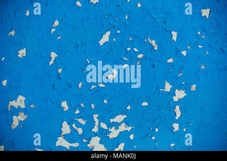 Peeling paint on wall seamless texture. Pattern of rustic blue grunge material. Stock Photo