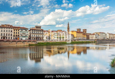 View of Ponte Vecchio with reflections in Arno River, Florence, Italy Stock Photo