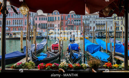 View on classical picture of the Canal Grande with moored gondolas in Venice, Italy Stock Photo