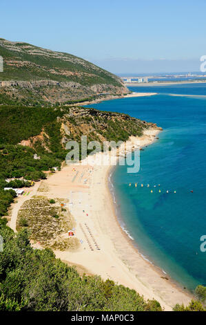 The beautiful beach of Portinho niched in the Arrábida mountains. Setúbal, Arrábida Natural Park, Portugal Stock Photo