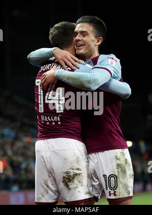 Aston Villa's Conor Hourihane (left) celebrates scoring his side's second goal of the game with teammate Jack Grealish during the Sky Bet Championship match at Villa Park, Birmingham. Stock Photo