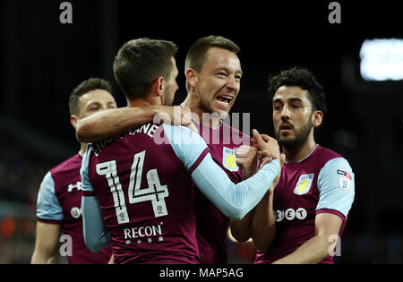 Aston Villa's Conor Hourihane (left) celebrates scoring his side's second goal of the game with teammate John Terry during the Sky Bet Championship match at Villa Park, Birmingham. Stock Photo