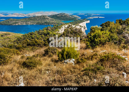 View from heights of Dugi Otok looking out on the adriatic and Kornati National Park islands with the Telašćica cliffs visible centre frame Stock Photo