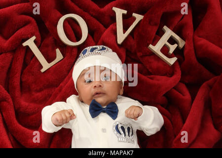 10 week old ethnic baby boy, LOVE Stock Photo