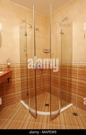 Modern bathroom interior with shower cabin and white toilet bowl Stock ...