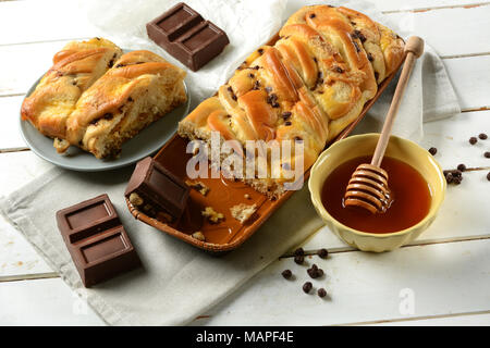 brioche with chocolate and honey - cake shaped braid - closeup Stock Photo