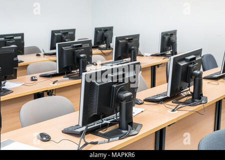 Empty computer room neatly placed for student in a computer lab. Stock Photo