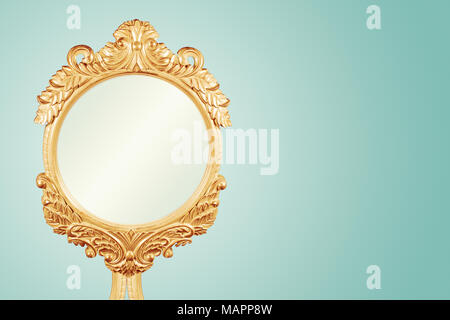 Antique Gilt Gold Frame Handcrafted Carved Wood Mirror Frame With Ornament Designs and Turquoise Background, Retro style, Ideal For Blank Space For Yo Stock Photo