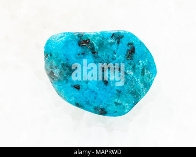 macro shooting of natural mineral rock specimen - blue Agate gemstone on white marble background from Mexico Stock Photo
