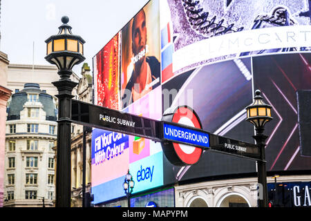 Entrance to tube station, advertisement, Piccadilly Circus, London, England, United Kingdom, Europe Stock Photo