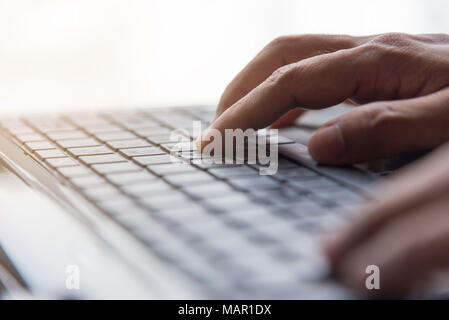 Hand typing Keyboard, internet online concept, selective focus Stock Photo