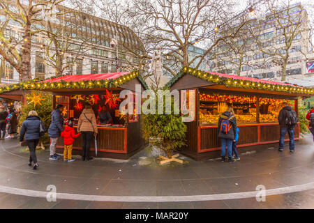 Christmas Market Stalls and William Shakespeare Fountain in Leicester Square, London, England, United Kingdom, Europe Stock Photo