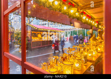 Christmas Market Stalls and shoppers in Leicester Square, London, England, United Kingdom, Europe Stock Photo