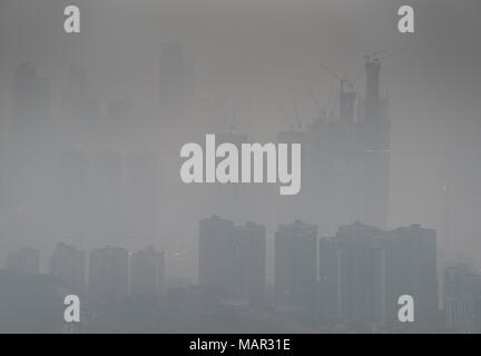 Skyline in heavy fog of the city of Chongqing under construction, Chongqing, China, Asia Stock Photo