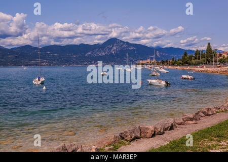 View of boats on Lake Garda from near Albisano, Lake Garda, Veneto, Italian Lakes, Italy, Europe