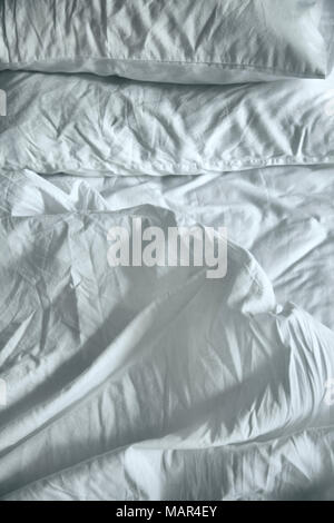 Unmade Bedsheets Stock Photo