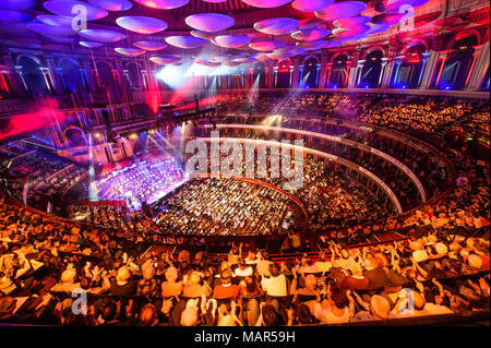 The Royal Liverpool Philarmonic orchestra, conducted by Maxine Tortelier, at Classic FM Live at London's Royal Albert Hall, staged by the UK's most popular classical music station. Stock Photo