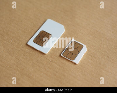SIM and USIM cards used in mobile telephony devices such as phones and smart phones Stock Photo