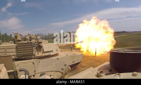 Troopers with Delta Tank Company, 6th Squadron, 8th Cavalry Regiment, 2nd Armored Brigade Combat Team, 3rd Infantry Division, fire the main gun round at a target during unit gunnery, March 29 at Fort Stewart, Ga. This gunnery marked the first time 2nd ABCT Troopers fired their newly received M1A1-SA Abrams Tanks since the brigade converted from a light to an armored brigade combat team. (Courtesy Photo)