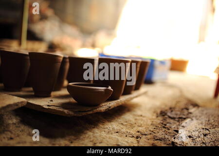 Variety of earthenware made out of clay using traditional method. Stock Photo