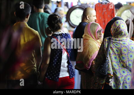 Bangalore, India - October 16, 2016: Unknown people busy in shopping area for their needs this evening at MG Road, Bangalore. Stock Photo