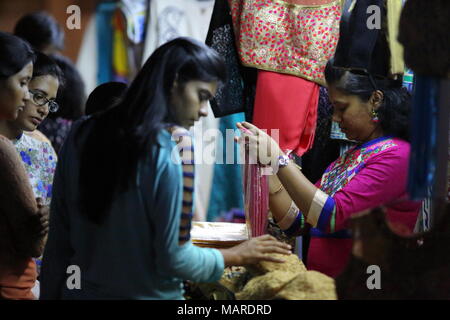 Bangalore, India - October 16, 2016: Unknown people busy in shopping apparels this evening at MG Road, Bangalore. Stock Photo