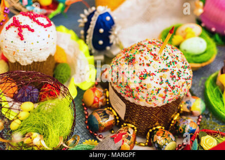 Easter cakes and painted eggs in the basket Stock Photo