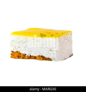 slice of creamy lemon mousse cheesecake on a white isolated background  room for text Stock Photo