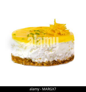 creamy lemon mousse cheesecake on a white isolated background with a small decorations round in shape room for text Stock Photo