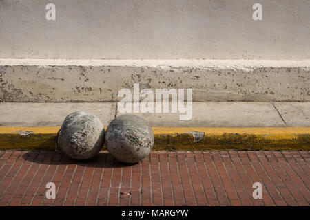 concrete balls on road - stone bollard , no parking concept - Stock Photo