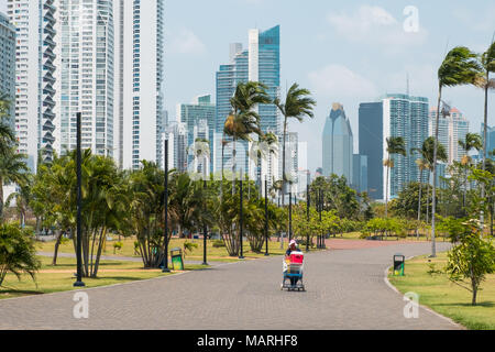 Panama City, Panama - march 2018: Beverage vendor in public park with city skyline at coast promenade in Panama City Stock Photo