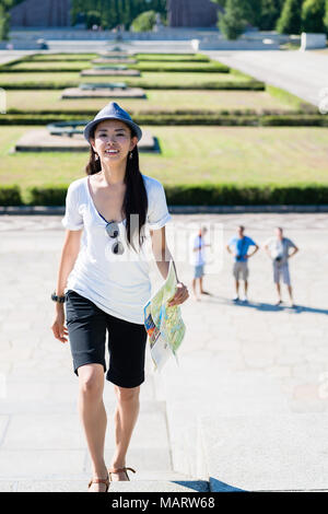 Happy Asian woman during summer vacations Stock Photo