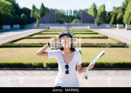 Happy Asian woman during summer vacations Stock Photo