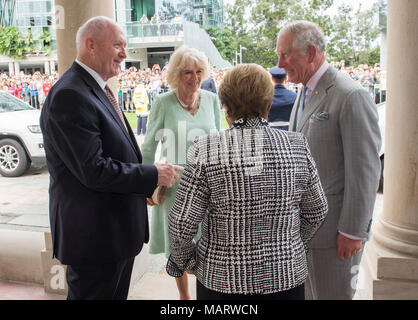 The Prince of Wales and the Duchess of Cornwall are greeted by the Governor General Sir Peter Cosgrove and Lady Cosgrove at Old Government House in Brisbane, Australia. Stock Photo