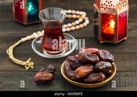 Ramadan Kareem Festive, close up of oriental Lantern lamp with dates on ...