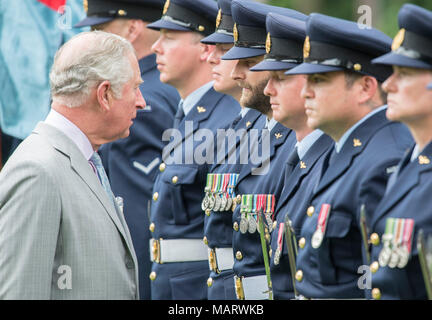 The Prince of Wales inspects military personel during the Ceremonial Welcome at Old Government House, Brisbane, on day one of the Royal visit to Australia. Stock Photo