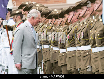 The Prince of Wales inspects military personel during the Ceremonial Welcome at Old Government House, Brisbane, on day one of the Royal visit to Australia. Stock Photo
