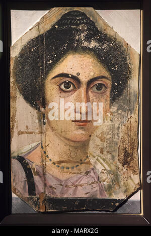 Female mummy portrait of the Fayum type dated from the 4th century AD found in Antinopolis on display in the Museo archeologico nazionale (National Archaeological Museum) in Florence, Tuscany, Italy. Stock Photo