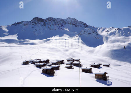 small alpine village winter landscape in Switzerland Stock Photo