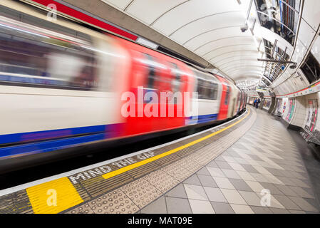 London Underground train pulling into station, UK, London Stock Photo