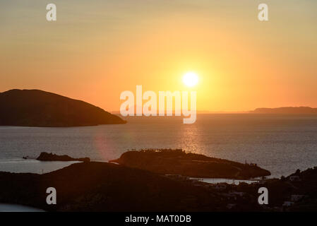 The sun setting over the Aegean Sea from Ios Stock Photo