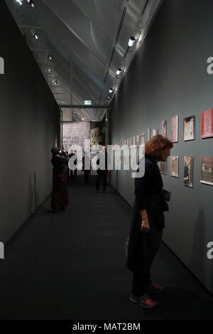 Frankfurt, Germany. 3rd Apr, 2018. People visit the exhibition 'Basquiat: Boom for Real' in Schirn Kunsthalle in Frankfurt, Germany, on April 3, 2018. The exhibition which lasts until May 27 focuses on American artist Jean-Michel Basquiat's relationship to music, text, film and television, situating his talents within a broader cultural context. Basquiat, an American artist who started as a graffiti artist in New York, was known as a Neo-expressionist and Primitivist painter in the 1980s. Credit: Luo Huanhuan/Xinhua/Alamy Live News Stock Photo