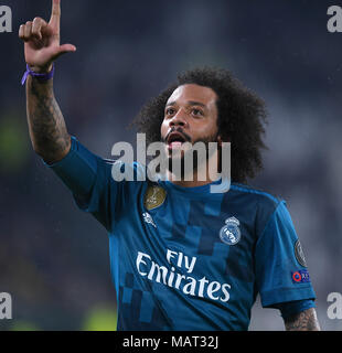 Turin, Italy. 3rd Apr, 2018. Real Madrid's Marcelo celebrates scoring during the UEFA Champions League quarterfinal first leg soccer match between Juventus and Real Madrid in Turin, Italy, on April 3, 2018. Real Madrid won 3-0. Credit: Alberto Lingria/Xinhua/Alamy Live News Stock Photo