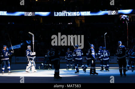 Tampa, Florida, USA. 3rd Apr, 2018. DIRK SHADD | Times .Tampa Bay Lightning players raises their sticks at center ice after defeating the Boston Bruins 4 to 0 at the Amalie Arena in Tampa Tuesday evening (04/03/18) Credit: Dirk Shadd/Tampa Bay Times/ZUMA Wire/Alamy Live News Stock Photo