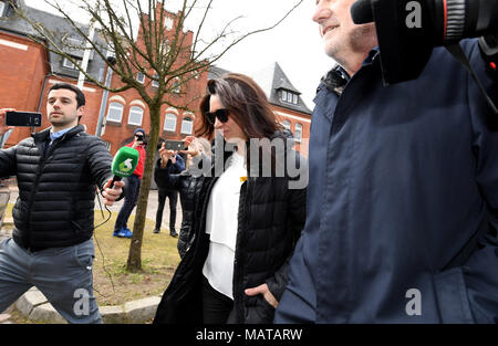 04 April 2018, Germany, Neumuenster: Marcela Topor, wife of former Catalan Regional President Carles Puigdemont, visits her husband at the correctional facility where he has been detained since late March. Businessman Josep Maria Matamala accompanies her. Photo: Carsten Rehder/dpa Stock Photo