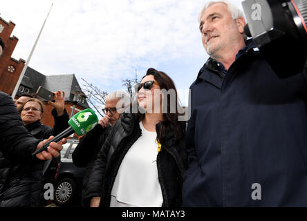 04 April 2018, Germany, Neumuenster: Marcela Topor, wife of former Catalan Regional President Carles Puigdemont, visits her husband at the correctional facility where he has been detained since late March. Businessman Josep Maria Matamala accompanies her. Photo: Carsten Rehder/dpa Stock Photo