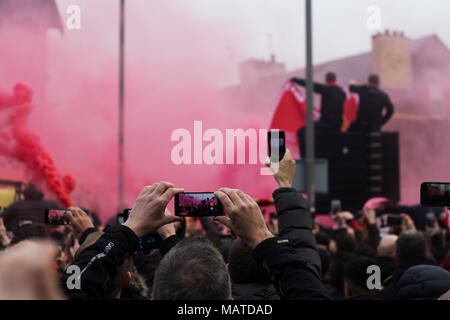 Anfield, UK. 4th Apr, 2018. Liverpool fans welcome the Liverpool FC players coach as it arrives at Anfield for the Quarter Final 1st leg of the Champions League. Credit: ken biggs/Alamy Live News Stock Photo