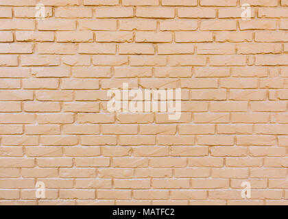 Beige painted brick wall background Stock Photo